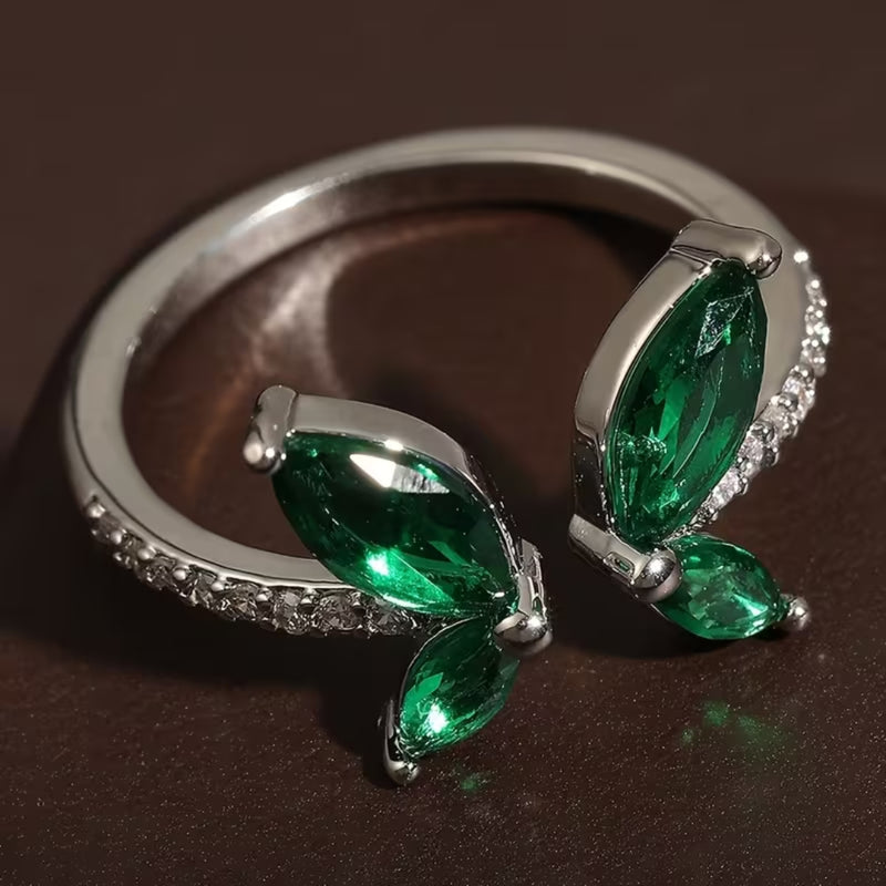 Oval Emerald Halo Statement Ring